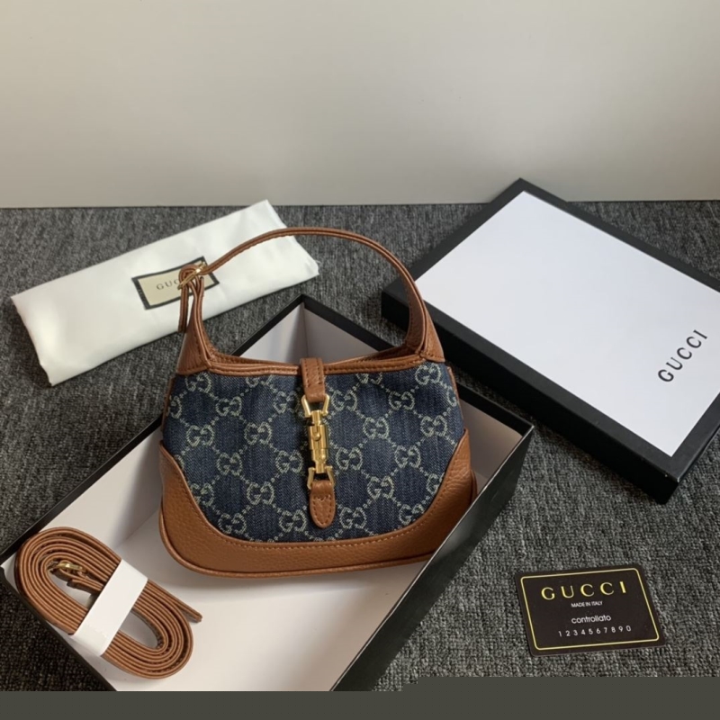 G*u*i top handle bags